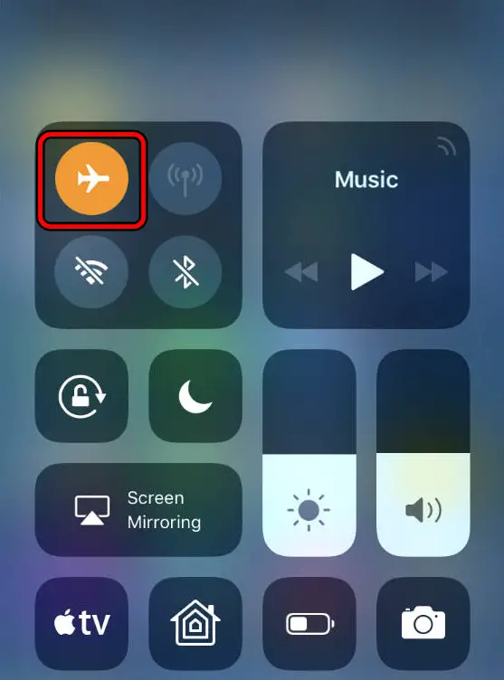 Enable Airplane Mode on the iPhone Through the Quick Settings Panel